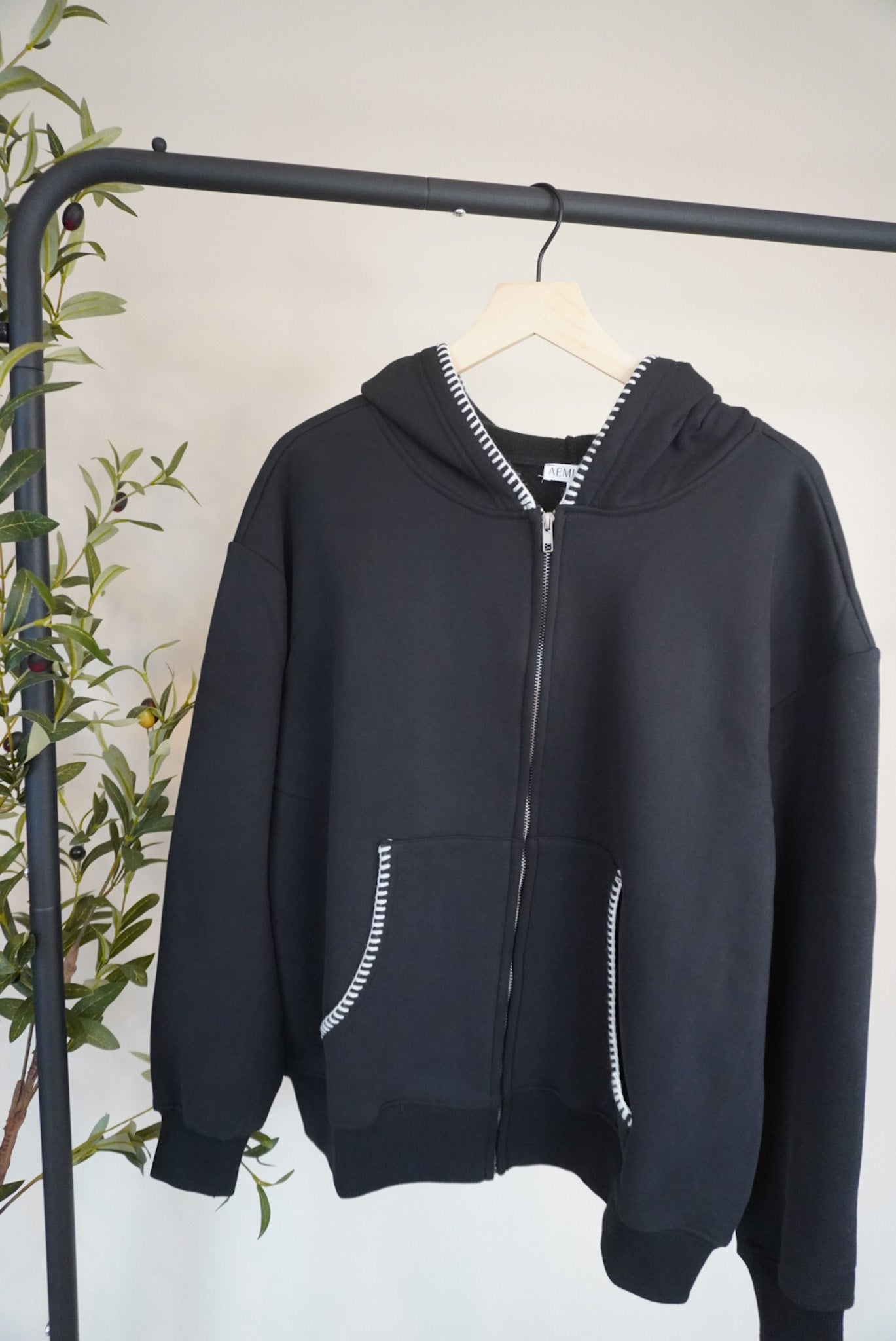 Noel Contrast Stitch Zip